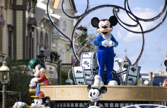 Mickey Mouse on a float during the Celebrate A Dream Come True Parade at the Magic Kingdom. 